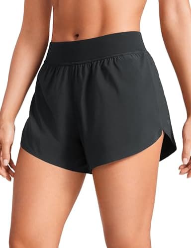 CRZ YOGA Mid Waisted Dolphin Athletic Shorts for Women 4" Lightweight High Split for Gym Workout with Liner Quick Dry Black Large